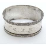 A silver napkin ring of ovoid form. Hallmarked Birmingham 1921 maker Lanson Ltd.