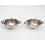 A pair of Victorian silver twin handled wine tasters / quaich hallmarked London 1891.