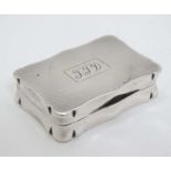 A silver snuff box with engine turned decoration.