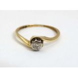 An 18ct gold ring set with diamond solitaire CONDITION: Please Note - we do not