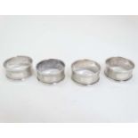 4 silver napkin rings with engine turned decoration Hallmarked 1963/65 maker B & Co (48g)