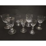 7 assorted small pedestal glasses,