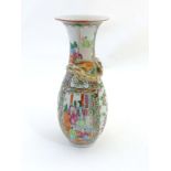 A Chinese famille rose medallion baluster vase with flared rim,