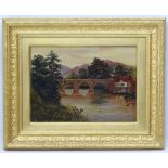 A 19thC gilt framed, Oil on canvas, Fly fishing river, heather covered hills in the distance,