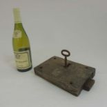 A Victorian cast iron key and door lock.