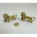 A pair of circa 1900 novelty brass knife rests in the form of Medici / St Mark's lions 1 1/8" high