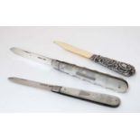 2 silver and mother of pearl handle folding fruit knives one hallmarked Sheffield 1905 maker Arthur