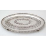 A silver plate stand of oval form with engraved decoration 7 1/4" long CONDITION: