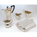 Assorted silver plated wared to include milk jugs sugar bowl, teapot, entree dish etc.