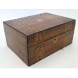 A c.1860 walnut hinged lidded box with parquetry banded inlay.