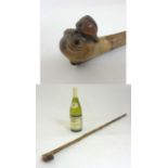 A Folk Art carved ash walking stick / cane, the root ball carved as the head of a boxer dog.