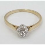 A 9ct gold ring set with diamond solitaire CONDITION: Please Note - we do not make