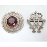 Two white metal Scottish brooches,