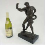 Massea : A patinated bronze sculpture, a man wresting a snake. Signed to base.