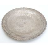 An Egyptian Silver dish with engraved decoration 6 1/4" diameter (122g) CONDITION: