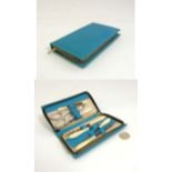 An early - mid 20thC mother of pearl handled manicure set together with scent stopper corkscrew and