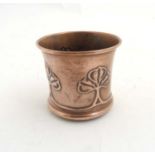 Decorative Metalware : An Arts and Crafts copper embossed pot measuring 2 3/8" high