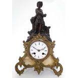 French Mantle Clock : A small 19th century Gilded bronze clock ,