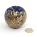 A Isle of Wight glass '' Azurene Black '' range paperweight formed as an apple,