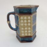 A late 19thC Wedgwood Majolica hexagonal pitcher/ jug with panel decoration and band motif designs
