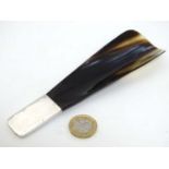 A horn shoehorn with white metal mount 7" long overall CONDITION: Please Note - we