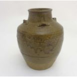 Studio Pottery: A mid 20thC two tone stoneware vase with lugs to neck,