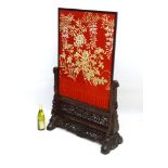 18 /19thC Chinese : a hand stitched silk screen on a very finely carved hardwood base ,