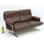 Vintage Retro: A Danish chrome and brown leather 2 seat brown leather sofa by Vatma,