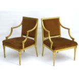 A pair of late 18thC Neoclassical gilt open armchairs with shaped fluted arm rests,