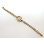9ct gold ladies watch : A Bingtima Star 15 jewel manual wind wristwatch with .
