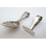 A child's silver spoon and pusher, hallmarked Sheffield 1943 Cooper Brothers & Sons Ltd.