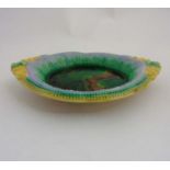 A c1880 English Majolica bread dish, with mottled green and brown centre,