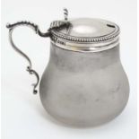 A Victorian frosted glass mustard pot with silver top and handle hallmarked London 1861 maker John