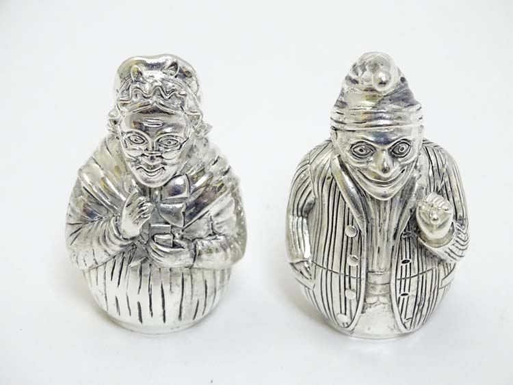 A pair of white metal novelty pepperettes formed as Punch and Judy figures. - Image 3 of 5
