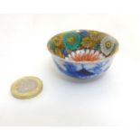 A miniature oriental bowl,