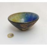 Scandinavian Pottery: A Retro Swedish Agge Ahlin bowl with blue and yellow glaze to interio,