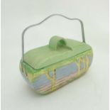 An Art Deco Beswick Biscuit Barrel, shape 170, decorated in hand painted tones of green,