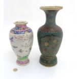 Two Oriental ceramic vases comprising a Japanese Totai Cloissone vase decorated with two panels