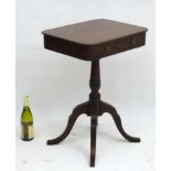 A Regency mahogany Occasional Table, with single short drawer and ring turned tapering pedestal,