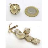 Masonic Interest : A small gilt metal sphere shaped fob opening into six hinged silvered pyramidal