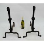 Salvage, Garden and Architectural: a pair of wrought iron andirons in the manner of Dr.