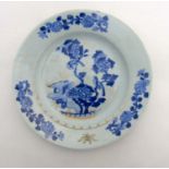 A Chinese Blue and White porcelain plate depicting birds amongst crysthanamum flowers with further