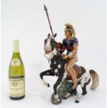 A 1967 Limited Edition Royal Doulton figure "Indian Brave" of a red Indian on a rearing horse with