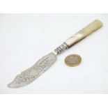 A Victorian silver butter knife with mother of pearl handle.