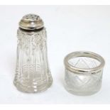 A cut glass salt with silver rim, hallmarked London 1919 maker Henry Perkins & Sons.
