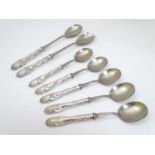 A pair of silver handled salad servers,