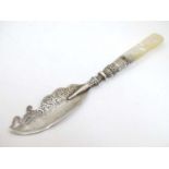 A silver butter knife with mother of pear handle. Hallmarked Birmingham 1902 maker A.