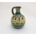 Scandinavian Pottery: A small Retro ceramic jug with various patterns to body,