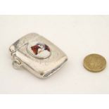 A silver plate vesta case with later applied 21stC ceramic cabochon with horse head decoration.