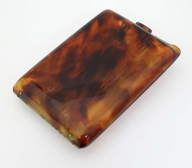 A faux tortoiseshell cigarette case with later applied ceramic decoration depicting dog head, - Image 4 of 4